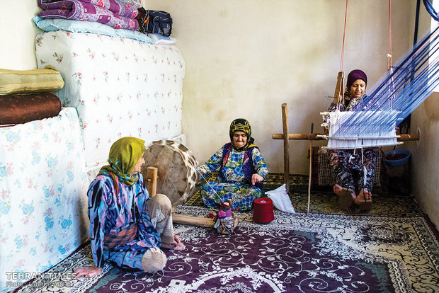 Mehrnesa and her daughter-in-law Houriyeh are spinning thread and weaving silk cloth.