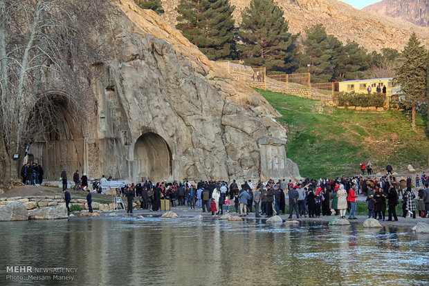 Tourists visit Taq Bostan in Kermanshah during Nowruz holidays 