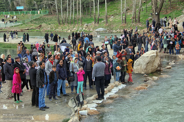 Tourists visit Taq Bostan in Kermanshah during Nowruz holidays 