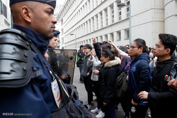 اعتراض به قتل شهروند چینی در پاریس‎