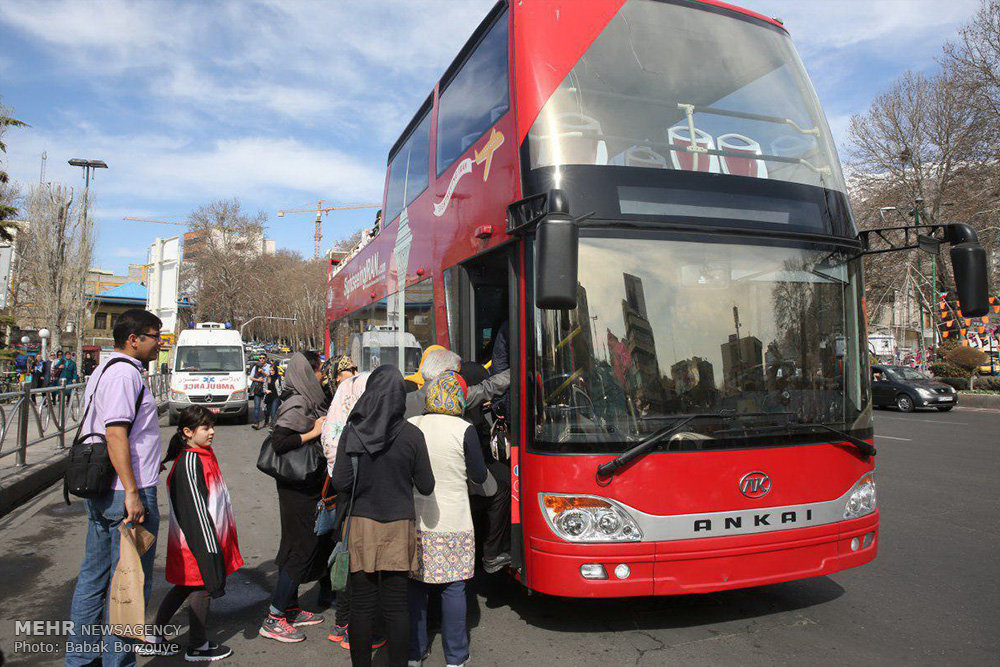 Sightseeing buses tour around Tehran in Nowruz