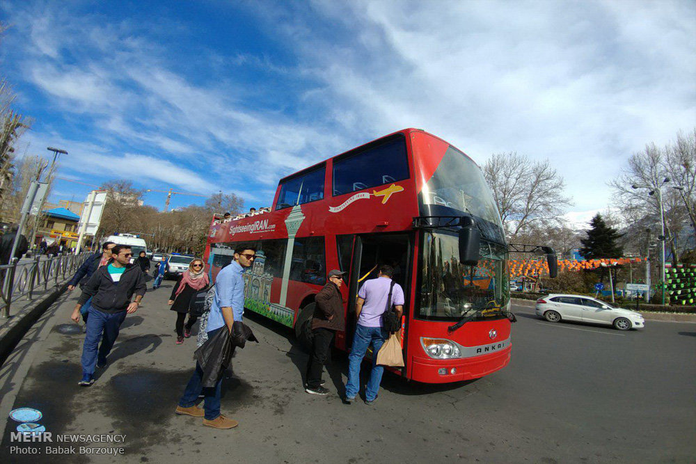 Sightseeing buses tour around Tehran in Nowruz