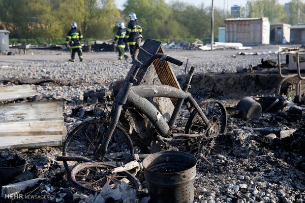 آتش سوزی در کمپ پناهجویان در فرانسه 