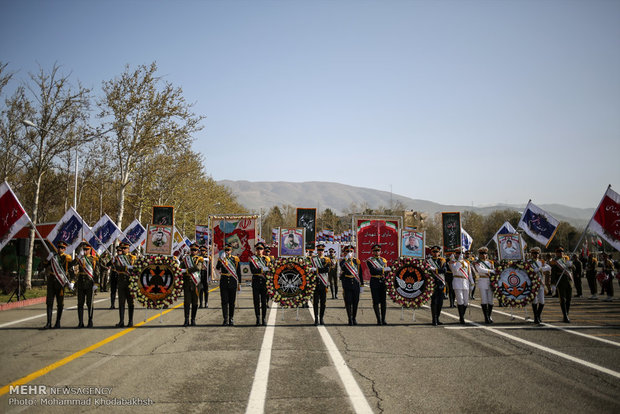 Iran’s army holds joint morning rituals before parade