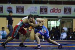 Iranian wrestlers win championship at Asian tournament