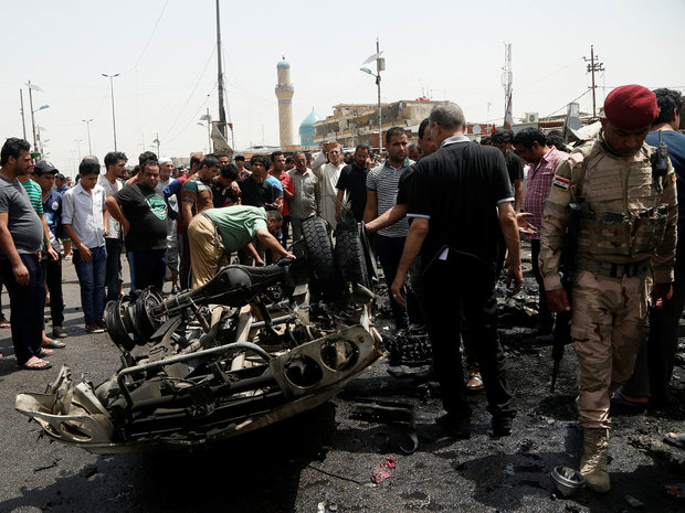 18 killed in twin suicide car attacks in Baghdad