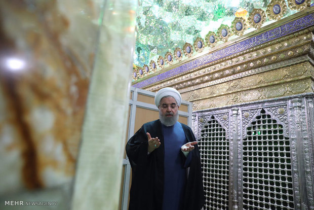 President Rouhani visits Qom