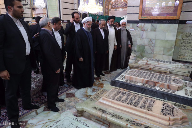 President Rouhani visits Qom