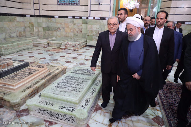 President Rouhani visits Qom