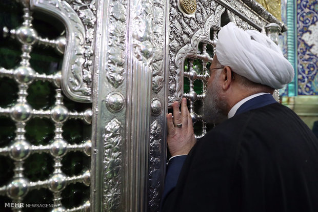 President Rouhani visits Qom