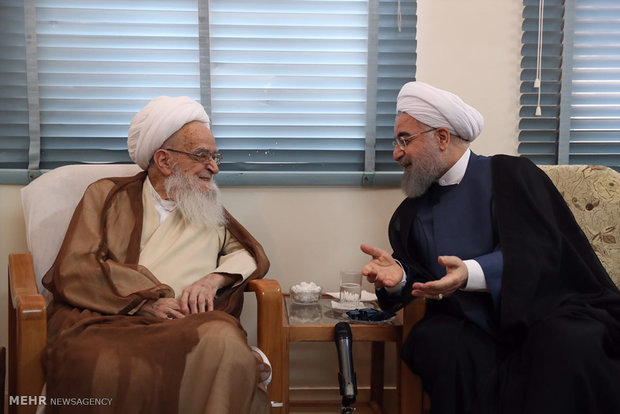 President Rouhani visits Qom