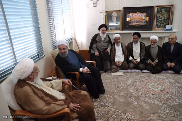 President Rouhani visits Qom