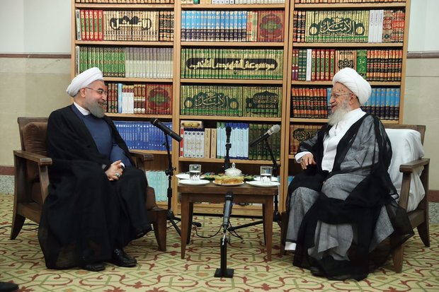 President Rouhani visits Qom