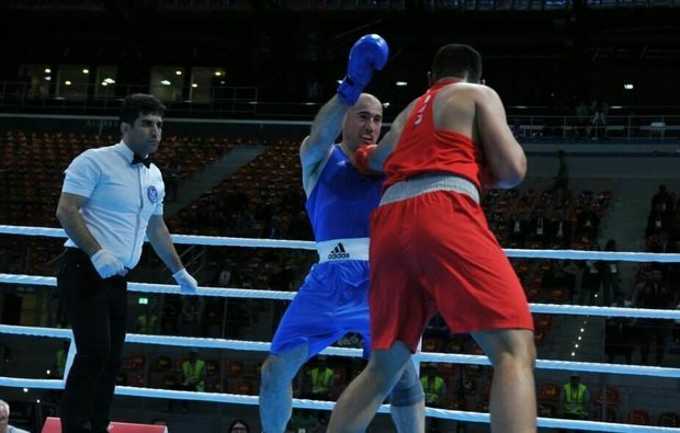 Iran’s boxing referee receives 3-star judge title