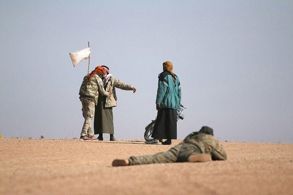 الرقة تحت مطرقة إرهاب "داعش" وسندان غارات "التحالف" 