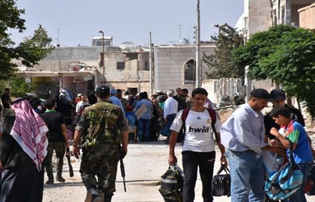 More families return to al-Waer neighborhood in Homs