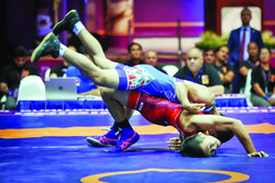 Pres. congratulates junior Greco-Roman wrestling team on win