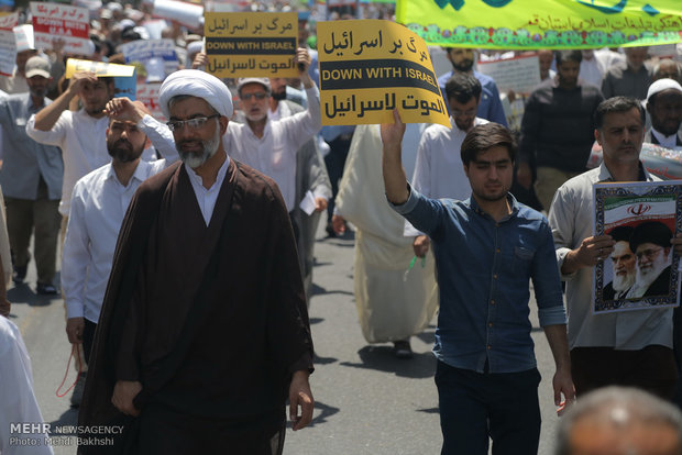 Iranians march in support of Myanmar, Palestine in Qom