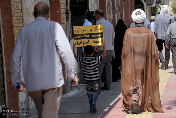 Iranians march in support of Myanmar, Palestine in Qom