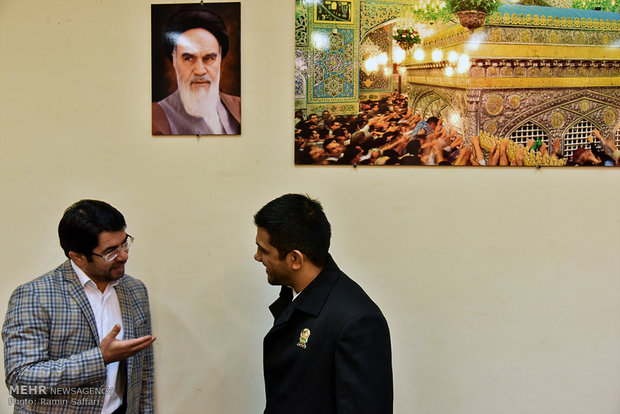 Former wrestling champ. bestows medals to Imam Reza museum