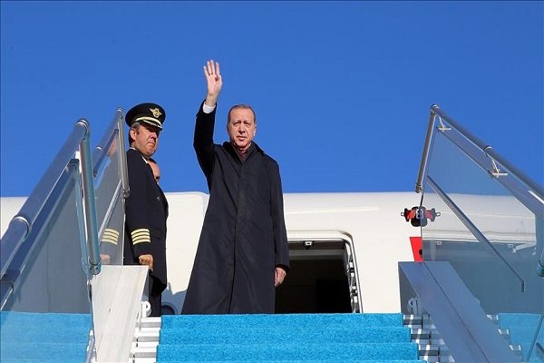 Turkey’s Erdogan lands in Tehran