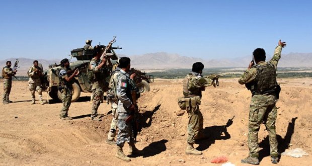 14 militants give up fighting in northern Afghan province 