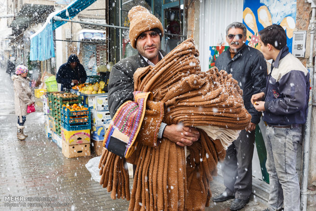 Snow whitens streets of Tabriz