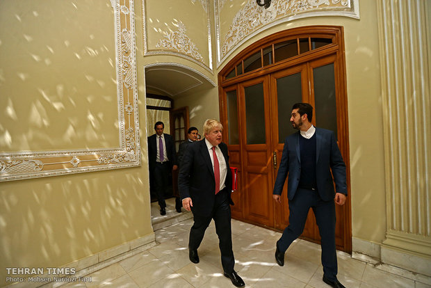 Iran's Larijani meets Boris Johnson