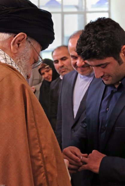 Leader receives Iranian hero athlete Alireza Karimi