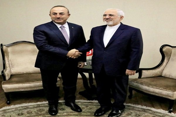 Zarif ile Çavuşoğlu Bakü'de bir araya geldi