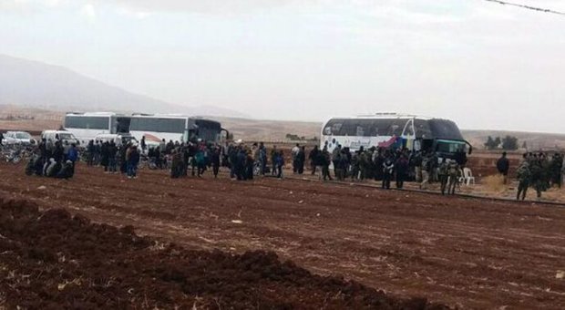  Tens of gunmen, their families evacuated from Beit Jinn area