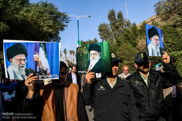 Iranians march streets to denounce riots