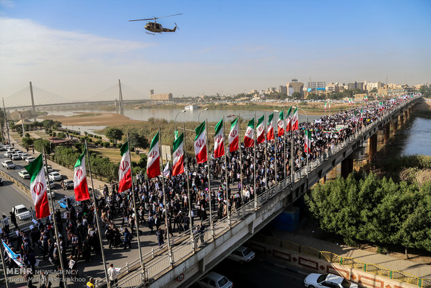 Iranians march streets to denounce riots