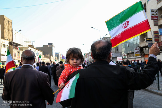 Iranians march streets to denounce riots