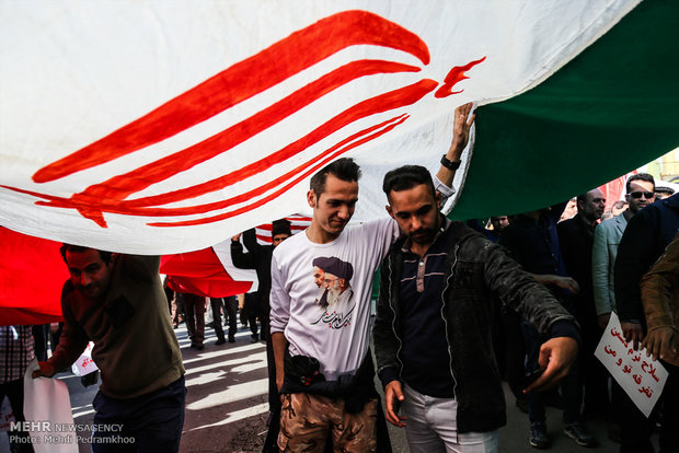 Iranians march streets to denounce riots