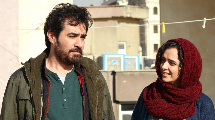 Shahab Hosseini (L) and Taraneh Alidoosti act in a scene from “The Salesman”.