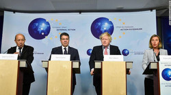 French Foreign Minister Jean-Yves Le Drian, from left, German Foreign Minister Sigmar Gabriel, British Foreign Secretary Boris Johnson and EU High Representative of the Foreign Affairs Federica Mogher