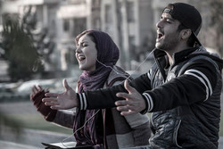 Ziba Karamali (L) and Saed Soheili act in a scene from “Lottery”. (Sahab Zaribaf)