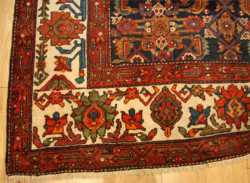 CAPTION: Close-up detail shows a typical Malayer carpet