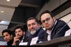 Director Mohammad-Hossein Mahdavian (1st R) and producer Mahmud Razavi (2nd R) and their colleagues attend a press conference about their latest film “Lottery” during the 36th Fajr Film Festival at Te