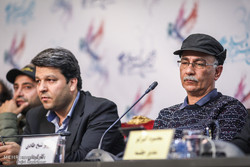 Producer Mohammad Khazaei (L) and director Parviz Sheikhtadi attend a press conference during the 36th Fajr Film Festival at Tehran’s Mellat Cineplex on February 6, 2018 to speak about their movie “Em