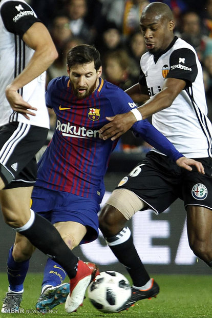 دیدار تیم های فوتبال والنسیا و بارسلونا‎