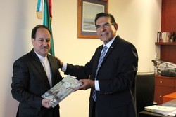 Iran’s Ambassador to Mexico Mohammad Taqi Hosseini (L) meets the president of Mexico’s health commission Senator Salvador López Brito
