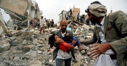 A man carries Buthaina Muhammad Mansour, believed to be 4 or 5, rescued from the site an air strike that killed eight of her family members in Sanaa, Yemen. Credit Khaled Abdullah/Reuters