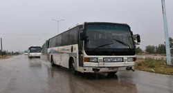 Buses enter al-Rastan city to transport 1st batch of terrorists to Syria