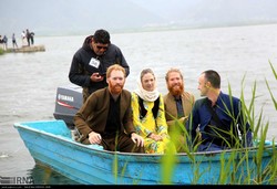 Foreign nationals in Kurdish costumes attending the festival