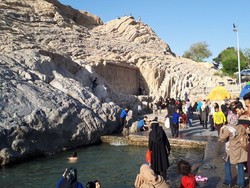 People visit Cheshmeh-Ali, a historical site in southern Tehran.