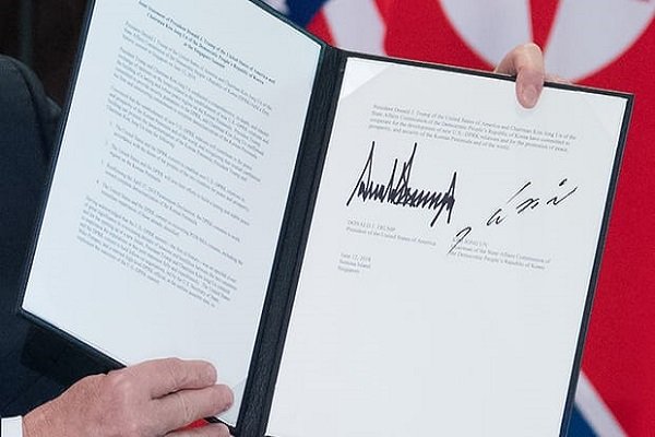 Trump, Kim sign joint document at historic summit