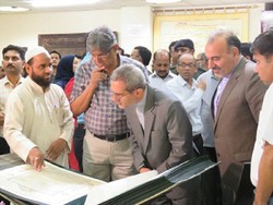People visit an exhibit of rare Quranic manuscripts at Dr. Zakir Husain Library in New Delhi on June 11.