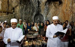 A file photo depicts followers of Zoroastrianism observing Pir-e Sabz rituals.
